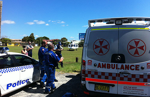 Emergency services combine at The Entrance as CareFlight prepares to fly the injured boy to hospital in Sydney.